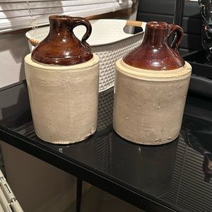 Antique stoneware whiskey jugs